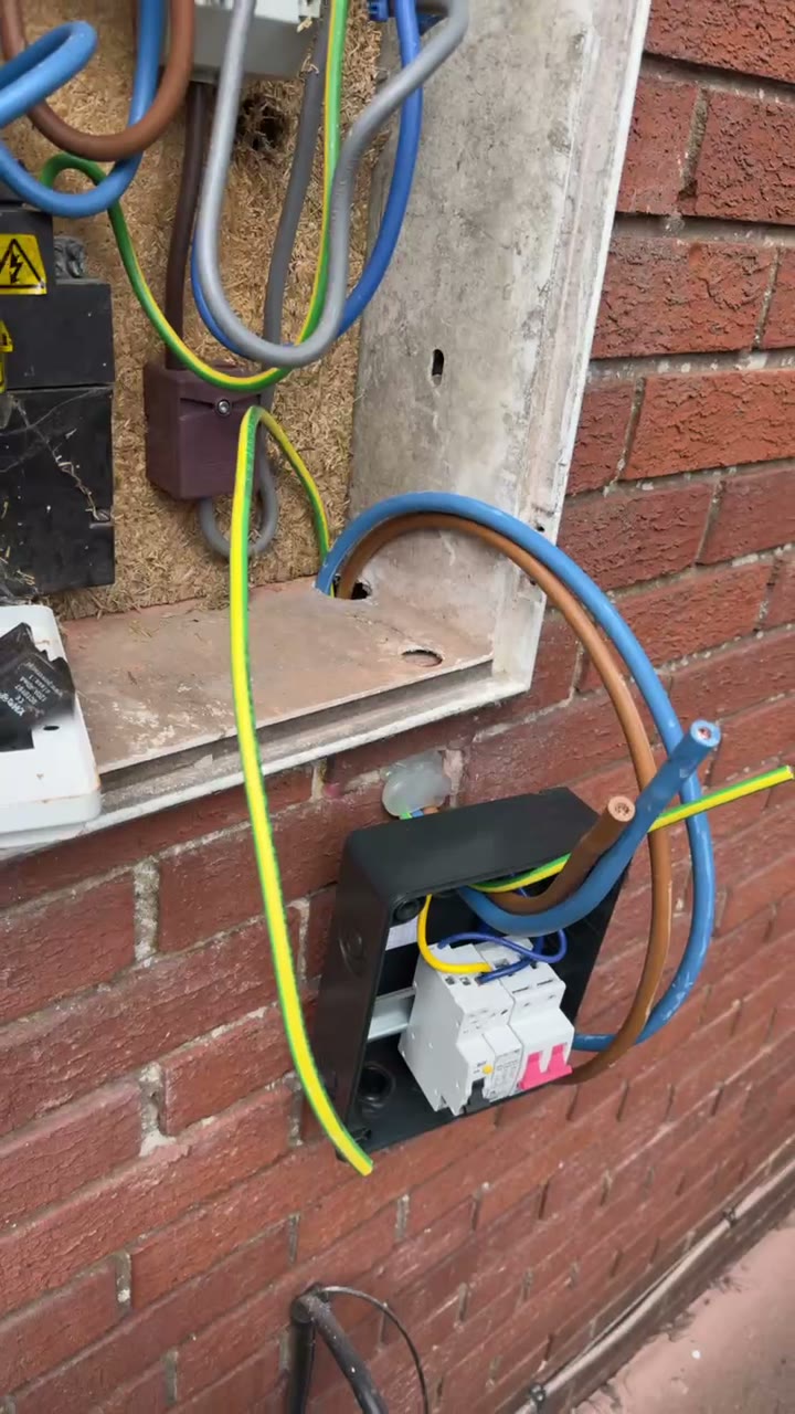 Outdoor meter box upgrade: an old isolator replaced with a new RCD enclosure in Coventry